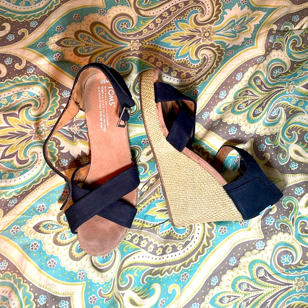 Black Tom’s heels size 8.5